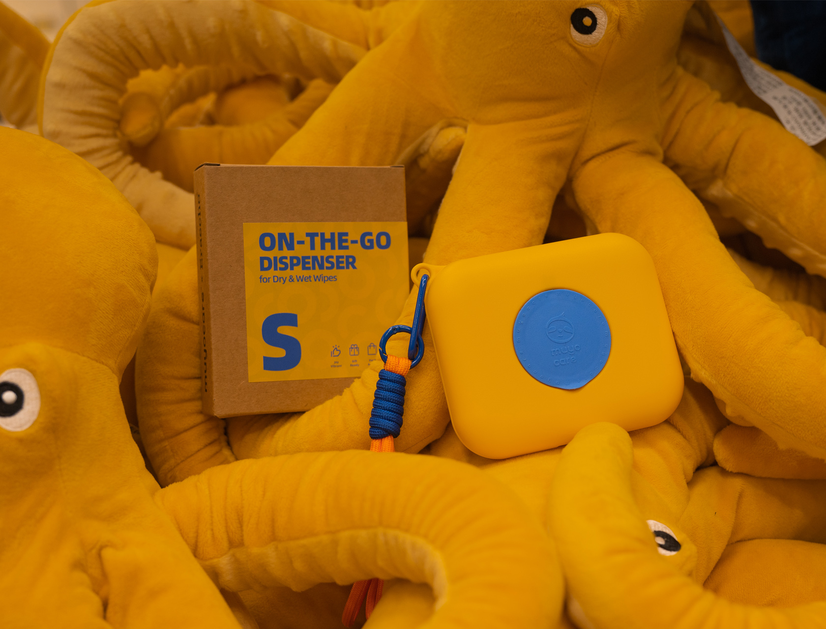 Cute plush octopus with a portable wipe dispenser, perfect for on-the-go hygiene, featured in Muyocare × Eraecho collaboration.