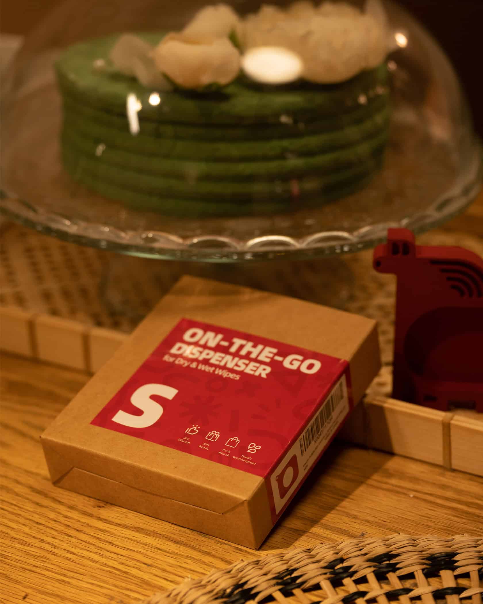 Portable wet wipe dispenser for easy hygiene on the move, perfect for travel and outdoor activities.